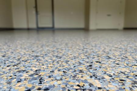 Epoxy Flake Flooring for High-Moisture Garages & Basements Thumbnail